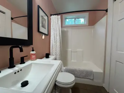 An Elegant Bathroom for Guests by Intown Craftsmen