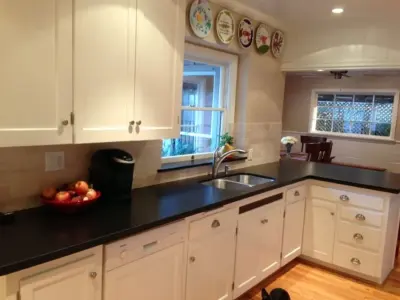 Pure Black Granite — Kitchen Remodeling project by Bella Stone Countertops