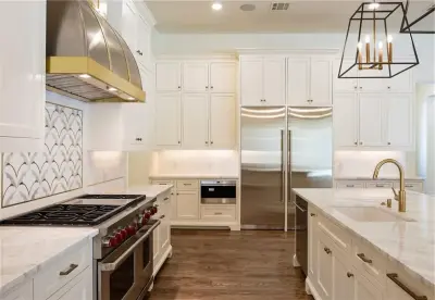 Brass and Acrylic at the Island by Boss Design Center