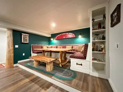Adirondack-Themed Basement Renovation by Belle Ville Design Build