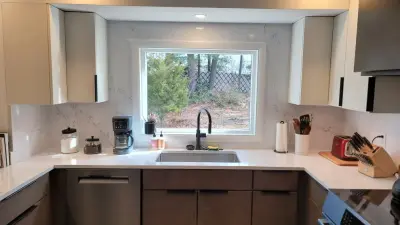 Modern Kitchen Renovation in Andover by Taylor And Stevens Cabinetry