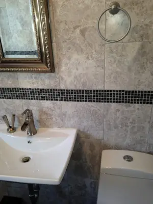 Bathroom Tile Wall Renovation by Argen Build