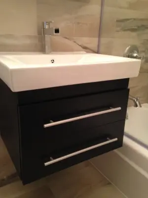 Contemporary Bathroom Renovation in West New York by Argen Build