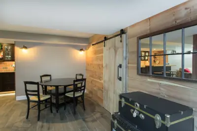 English Pub Renovation in the Basement by Saratoga Kitchens And Baths