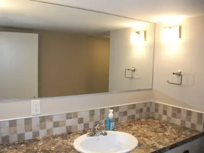 Basement Bathroom by Persona Kitchen & Bath Solutions, LLC