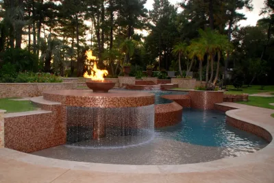 Woodlands Reverse Negative Edge Pool — Landscape Design project by Marquise Pools in The Woodlands