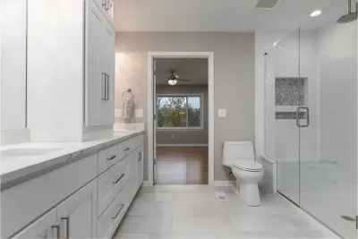 Restroom and Laundry Space Renovation by NextGen Remodeling LLC