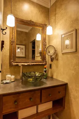 Riverside Old World Bathroom Design by Centerbeam Construction
