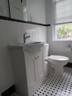 Baltimore, MD Bathroom Renovation in White by TradeMark Construction