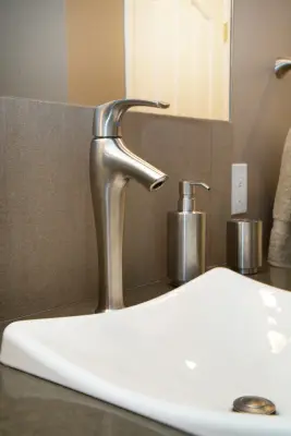 Elegant Gray Restroom — Kitchen Remodeling project by Featured Kitchen And Bath, Inc.