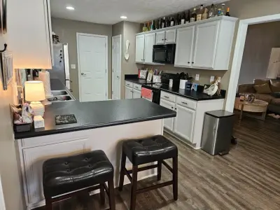 Stunning Kitchen Renovation Featuring New Two-Tone Cabinet Colors by Kitchen Solvers Of Spring Hill