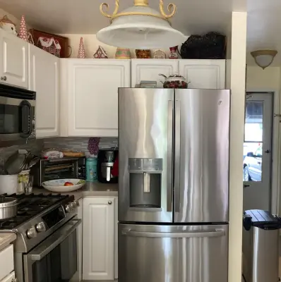 Stunning Kitchen Makeover Featuring Dual-Colored Cabinets by Kitchen Solvers Of Grayslake