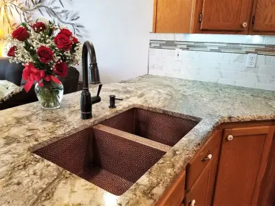 Stunning Kitchen Featuring Blue Dunes Granite by Spokane Stone Creations LLC
