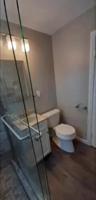 Sand-colored Tile Shower — Kitchen Remodeling project by Country Gentlemen Kitchen & Bathroom Remodeling