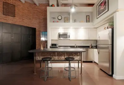 Contemporary Industrial Elegance - Boston Loft Interior and Furniture Design by Cabanilla Design Collective