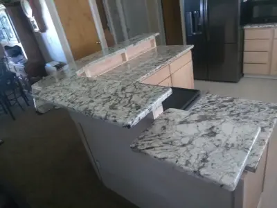 White Spring Granite — Kitchen Remodeling project by Big Wood Cabinets, LLC