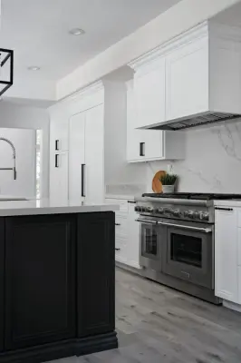 Ivory Culinary Space — Kitchen Remodeling project by Miller & Sons Construction Group