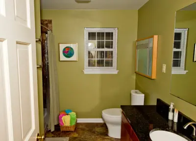 Breckenridge Village Restroom by Home Run Remodeling & Construction, Inc.