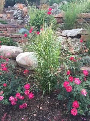 Upper Canyon Road Retaining Wall with Boulders — Landscape Design project by McCumber Fine Gardens