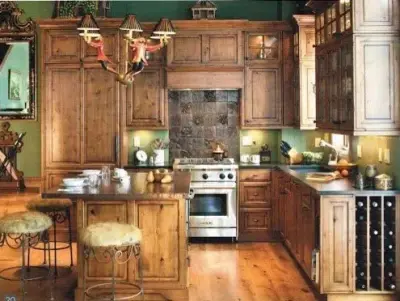 Charming Kitchen Featuring Distinctive Wooden Accents by Cabinets Etc By Design