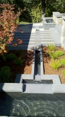 hillside courtyard rain garden — Landscape Design project by Merge Studio