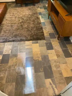 Revamped Traditional Slate Tile Flooring for Client's Family Room by Grain & Steel Contracting LLC
