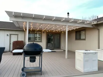 Composite Patio Deck with Trellis and Lighting, 820 sq ft by RIEK Builds, Inc.