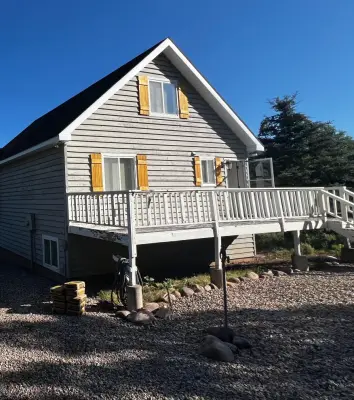 OAKLEY CABIN - Renovation of Front and Back Decks and Stairs by Modern International Builders