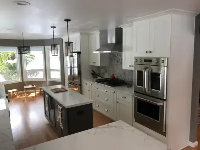 Paterson Kitchen Transformation: Ed and Theresa's Before and After by Bridges Const.