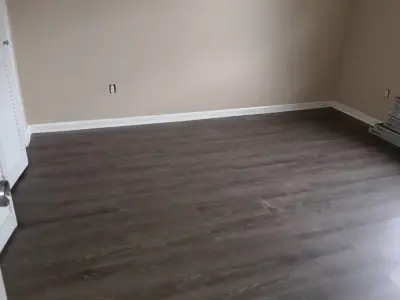 Luxury Vinyl Plank Flooring — Home Renovation & Remodeling Services project by B. Smart Construction