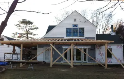 Plymouth Farmhouse Veranda Extension by Zinran Construction Services Inc.