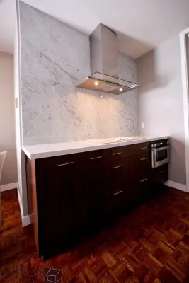 Newport Beach Home Renovation with APlus Cabinets and Wood Flooring by APlus Interior Design & Remodeling