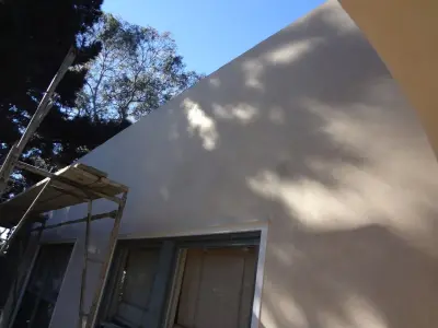 Stucco and Wood Restoration / Flat Roofing / Torch-Down Roofing by Precision Home Design & Remodeling