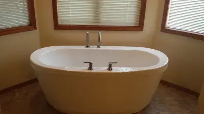 Revamping a Worn-Out 80's Master Bathroom — Home Renovation & Remodeling Services project by Bade Brothers Building Company