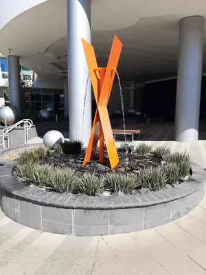 Urban modern condominium complex in the Warner Center featuring the Modfounta — Landscape Design project by Modfountain.com in Los Angeles