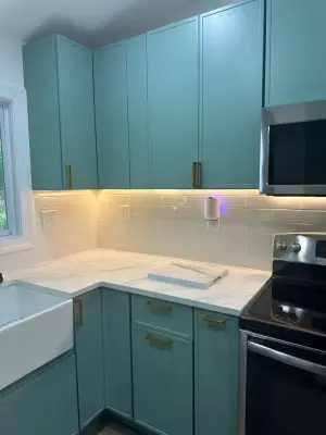 Olive green kitchen renovation by PLF Design & Remodeling