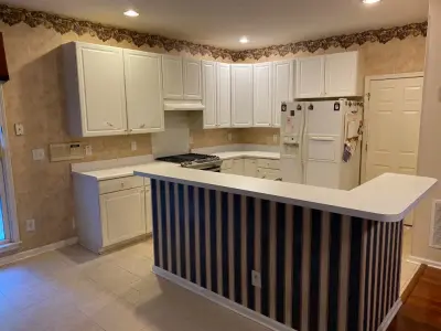 White Kitchen Renovation with Shaker Style — Home Renovation & Remodeling Services project by Hill Residential Contractors