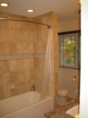 Soffit, bathroom, kitchen, family area with wet bar for Mark and Vicky by Lee Price Contractors