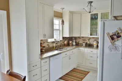 Compact Kitchen Renovation by Twin Lakes Woodworking & Remodeling