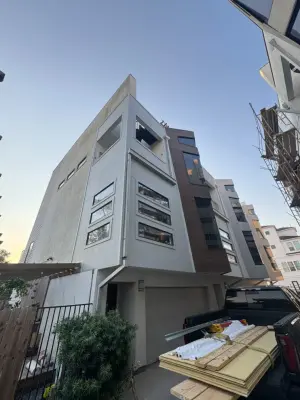Brazilian Siding Installation for Stucco Replacement by Ultimate Construction