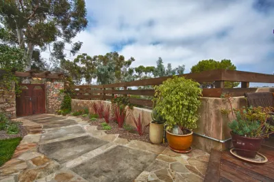 Eclectic San Diego Backyard by Mooch Exterior Designs, Inc.