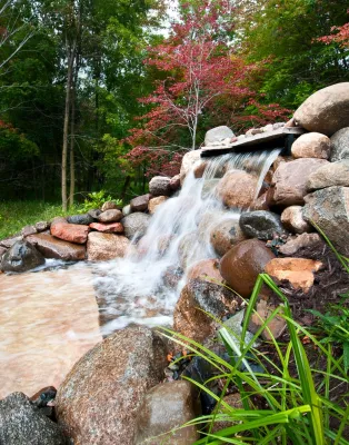 Natural Water Features by MT Carpenter Landscape Inc.
