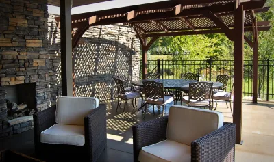 Outdoor Living Area by MT Carpenter Landscape Inc.