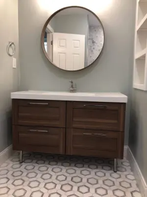 Modern Basement and Bathroom Renovation by Conservation Renovations Inc.
