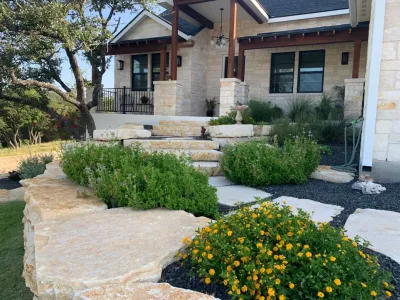Retaining wall, steps & planting by Native Roots Landscape