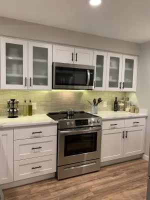 Contemporary White Kitchen Renovation — Home Renovation & Remodeling Services project by Wise Choice Construction