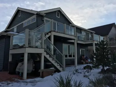 Transparent Barrier Railing — Window Installation & Replacement project by Victory Window & Remodeling