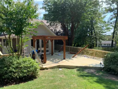 Deck makeover with a new pergola — Window Installation & Replacement project by C & D Home Solutions