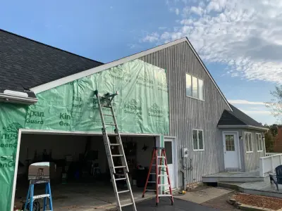Midnight Blue Siding Installation — Window Installation & Replacement project by Windows And More
