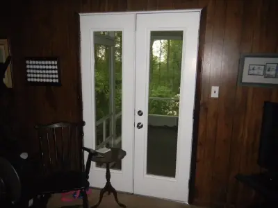 Tailored French Style Steel Entry Doors — Window Installation & Replacement project by Thermal Sash Window And Door Systems, Inc.